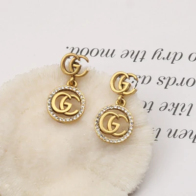 Brincos de argola de marca famosa de joias de luxo por atacado Gucci′ S Gg Mulheres inspiradas em brincos de designer de marca popular